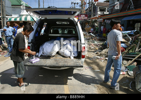 Dead bodies are collected in the back of a truck at Patong Beach, Phuket Island, Thailand after the December 26, 2004 tsunami. Stock Photo