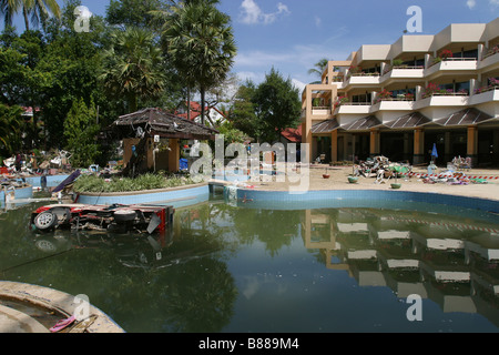 A vehicle in a Holiday Inn swimming pool at Patong Beach, Phuket Island Thailand two days after the December 26, 2004 tsunami. Stock Photo