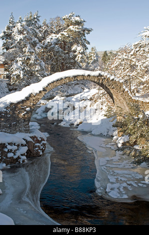 The historic 1717 crossing over the Dulnain River at Carrbridge Strathspey in the Cairngorms National Park  SCO 2077 Stock Photo