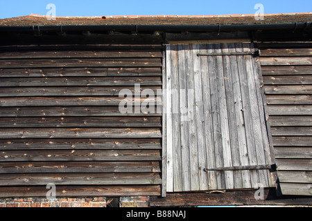 victorian barn hayloft hay bale loading door medway valley walk river medway yalding kent uk Stock Photo