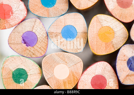 Many pencils of different colors on a over white background Shallow DOF  Stock Photo