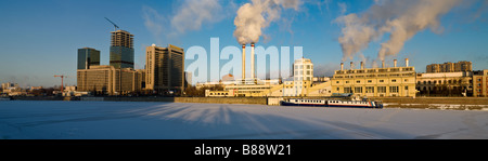 Panorama of Moscow World Trade Center with new buildings under construction and an old powerplant on a cold winter morning Stock Photo