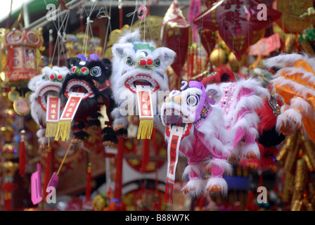 Dragon dancing puppets for sale in Chinatown during the annual Chinatown Lunar New Year Parade Stock Photo