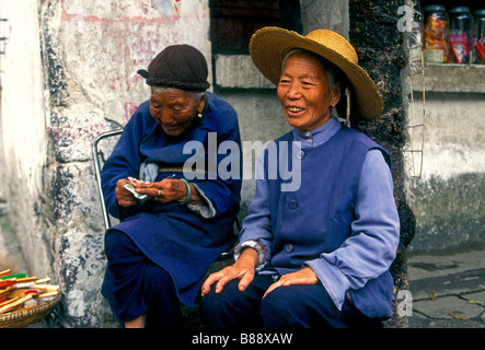 2, two, Chinese women, Bai women, Bai ethnicity, ethnic minority, mature women, old women, elderly women, friends, Dali, Yunnan Province, China Stock Photo