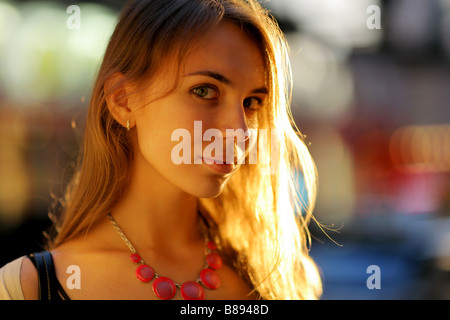 Portrait of a beautiful young woman in sunlight Shallow DOF Stock Photo