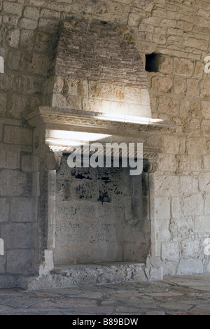 Fireplace and chimney decoration stone carving inside Kolossi Castle situated near Limassol, South Cyprus Stock Photo