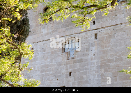 View of Kolossi Castle Lusignan escutcheon on the eastern wall, situated near Limassol, South Cyprus Stock Photo