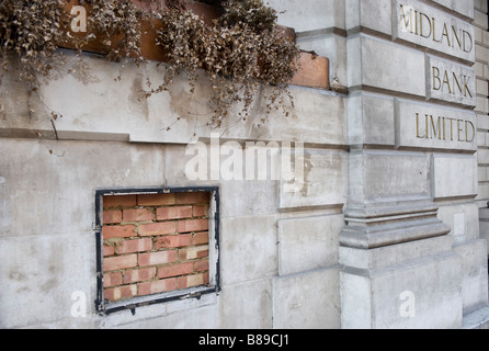 bricked-in-cash-dispenser-at-