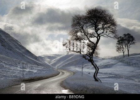 Scottish winter roads, Ascent to the Glenshee ski area, Cairnwell Pass on the A93 between Glenshee & Braemar, Cairngorms National Park,, Scotland, UK Stock Photo