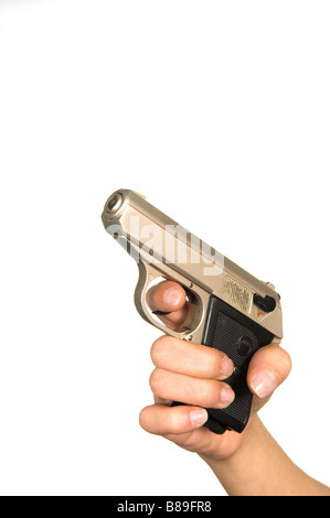 Woman's hand holding a gun Stock Photo