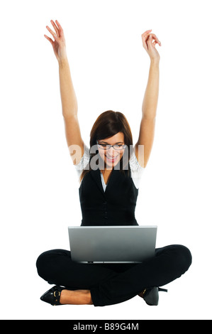 Successful businesswoman celebrating / new job / business idea with laptop on white background Stock Photo