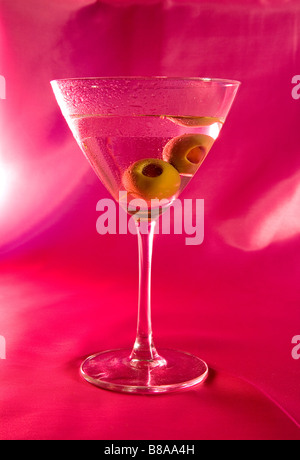 Two spanish olives in a vodka martini shaken not stirred Stock Photo