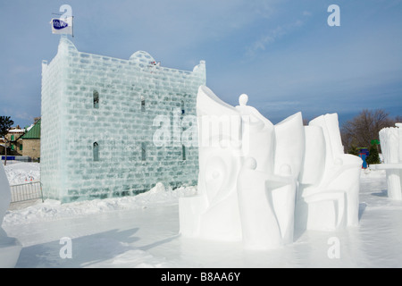 Snow sculptures and Natrel ice Tower at Winter Carnival Quebec City Canada Stock Photo