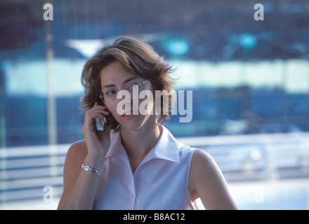 Young woman using mobile phone Stock Photo
