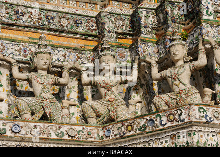 Detail of ceramic tiles and statues - Wat Arun buddhist temple in Bangkok. Thailand Stock Photo