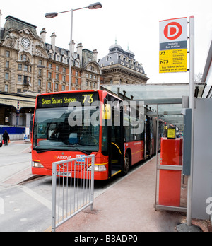 Bus stop With Bendy Buses At Victoria Bus Station London UK Europe Stock Photo