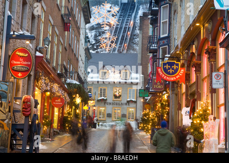 People shopping Rue Petit Champlain with funicular behind, Old Quebec City Canada Stock Photo