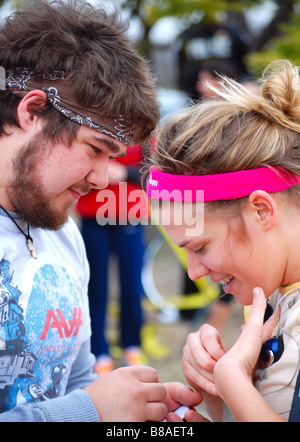 Happy couple looking at wedding ring Stock Photo