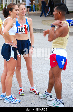 Runners talking after half marathon Stock Photo