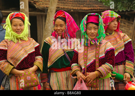 Flower Hmong girls in traditional dress, Sapa, Vietnam Stock Photo