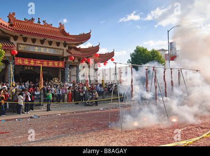 Firecrackers during the Chinese New Years Celebration. Stock Photo