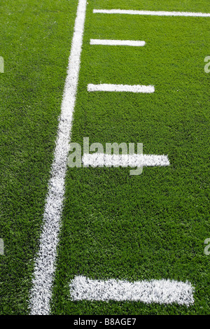 A new astro turf foot ball field Stock Photo