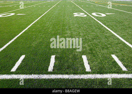 A new astro turf foot ball field Stock Photo