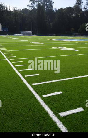 A new astro turf foot ball field Stock Photo