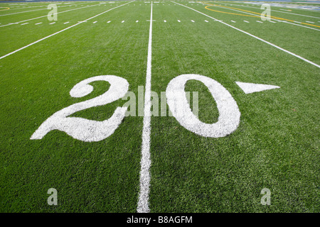 A new astro turf foot ball field Stock Photo