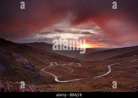 the road over the Healy Pass at dawn, Caha Mountains, Beara Peninsula, Co Cork, Ireland Stock Photo