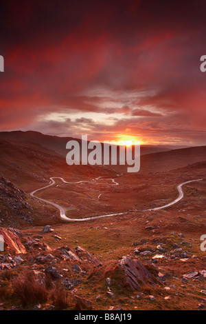 the road over the Healy Pass at dawn, Caha Mountains, Beara Peninsula, Co Cork, Ireland Stock Photo