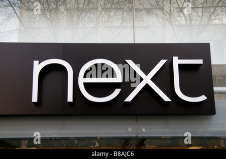 A sign above the door to the Next clothing shop, Oxford Street, London. Jan 2009 Stock Photo