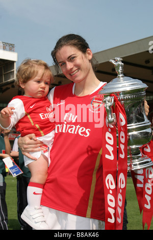 Karen Carney Arsenal Ladies FC holding niece and cup after winning women’s FA Cup 2008 women's cup final v Leeds United Ladies Stock Photo