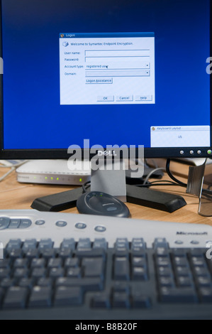 Computer monitor and keyboard displaying Symantec endpoint encryption login screen Stock Photo