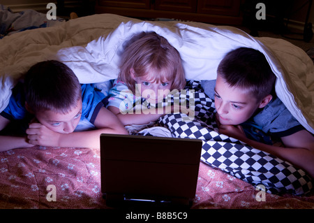 Children watching at night Stock Photo