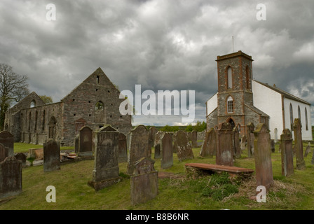 RUINS OF WHITHORN PRIORY CATHEDRAL AND TO THE RIGHT THE 1822 ST NINIAN S PRIORY PARISH CHURCH OF WHITHORN DUMFRIES & GALLOWAY Stock Photo