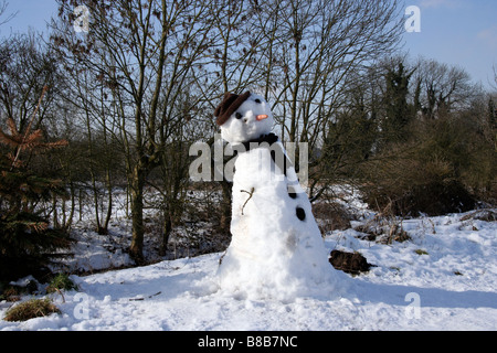 Snowman on a towpath Stock Photo