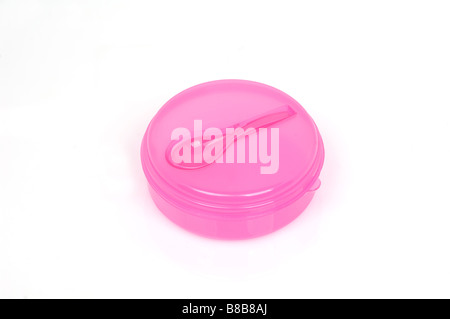 Pink plastic lunchbox cut out on a white background Stock Photo