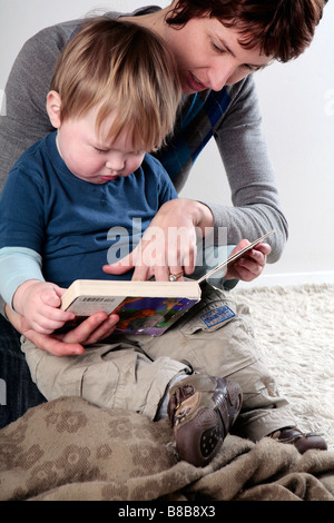 Baby boy and mother reading (with signed model release - available for commercial use)