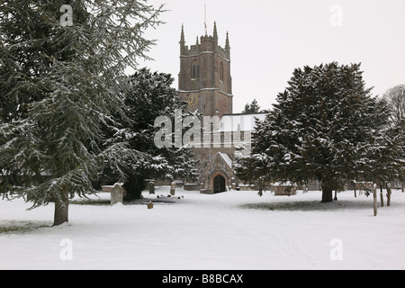 Saint James Church Avebury in the snow, Wiltshire, England, UK Stock Photo