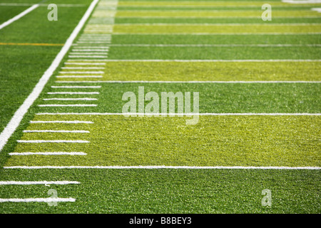 A new astro turf foot ball field Stock Photo