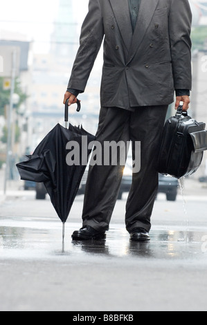 Business Man Broken Umbrella  Computer Bag Standing  Rain, Toronto,Ontario Stock Photo