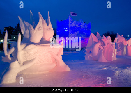 Snow sculptures and Natrel ice tower on Plains of Abraham Winter Carnival Quebec City Stock Photo