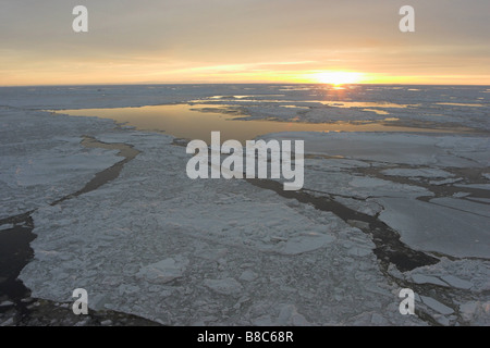 SUNRISE over sea-ice Stock Photo