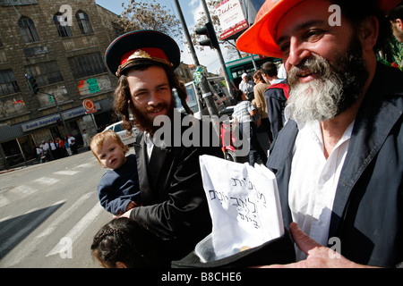 Religious Israelis celebrating Purim in Mea Shearim, a religious neighbourhood, in Jerusalem. Stock Photo