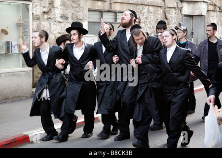 Orthodox Jews celebrating Purim, a Jewish religious festival, in Jerusalem. Stock Photo