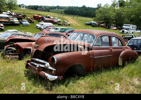 Classic cars rust peacefully in an American country junk yard Stock ...