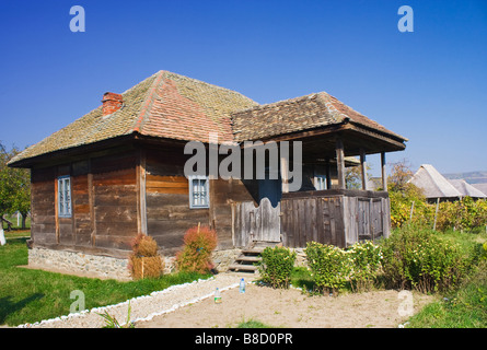 An old house made of wood from Romania Stock Photo