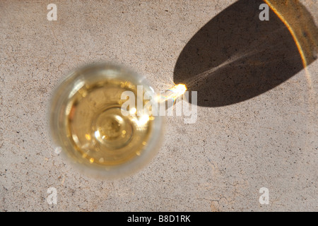 A concentrated sun spot created by sunlight going through a glass. Stock Photo
