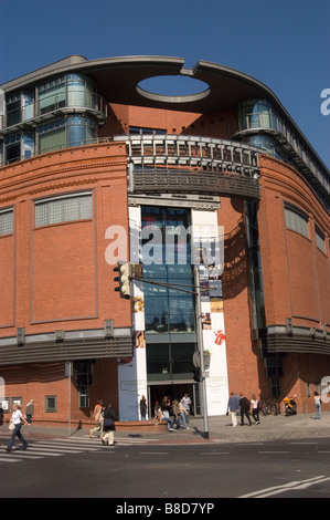 Contemporary architecture featuring glass and brick walls standing on a ...